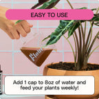 A hand pours brown liquid labeled Flourish Organic All-Purpose Plant Food by Flourish into a potted plant. Text reads EASY TO USE, with instructions: Add 1 cap to 8oz water and feed plants weekly.