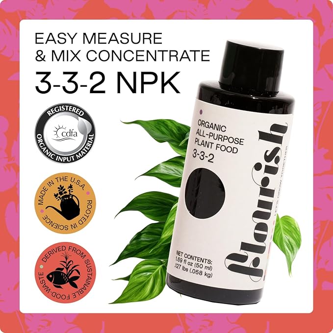 A bottle of Flourish Organic All-Purpose Plant Food by Flourish is shown with green leaves. This water-soluble fertilizer features easy-measure concentrate, organic certification, sustainable sources, and USA-made quality.