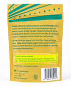 Back of Lost Pines Yaupon’s Yaupon Tea Bags (16) package in yellow and teal shows this caffeinated herbal tea’s caffeine, theobromine, and sustainable wild harvest. Includes brewing instructions, ingredients, barcode, and contact info.