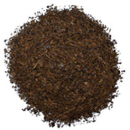 A loose mound of finely chopped, dried brown leaves and twigs—ideal for brewing Lost Pines Yaupon Tea Bags (16), a naturally caffeinated herbal tea from Lost Pines Yaupon—displayed on a white background.