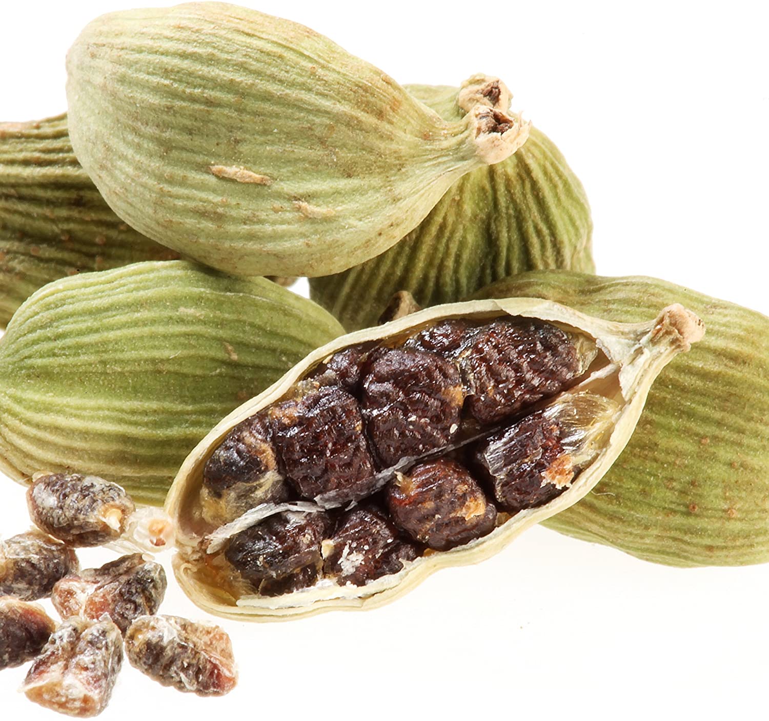 Close-up of Wellspring Gardens Cardamom Ginger (Elleteria cardamomum) pods—one split to display dark brown seeds and some scattered nearby—set on a white background, highlighting this spice’s key role in many curry powders.